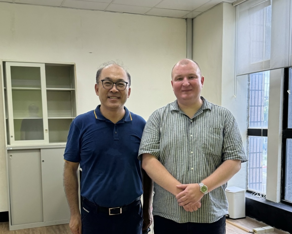 Distinguished Professor Hsu-Wei Fang, Director of the Center, with Prof. Aleksej Zarkov