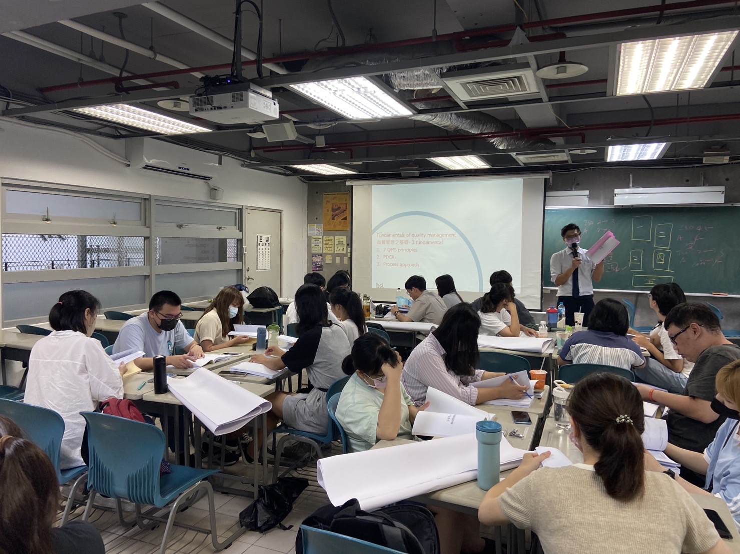 The BSI instructor is delivering a lecture